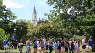 Students walking on campus during Pirate Adventure. 