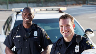 Police Officers smiling in uniform