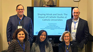 Faculty and a current Catholic Studies student at Princeton Conference
