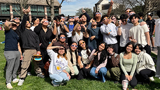 Students gathered on the Green to watch the Solar Eclipse